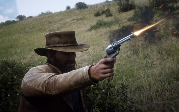 A male character aiming and firing a revolver in a grassy landscape.