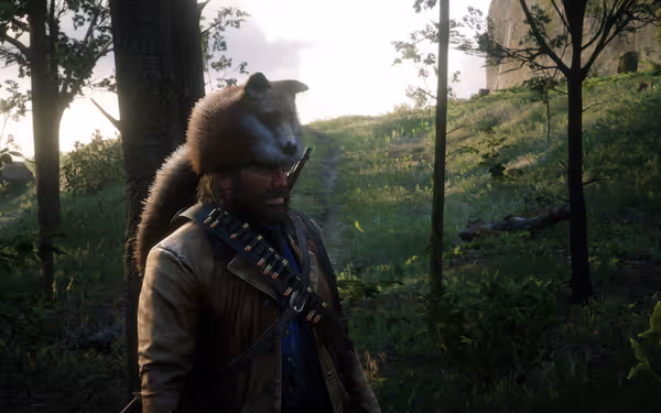 A male character wearing a raccoon hat and bandolier, standing in a sunlit forest.