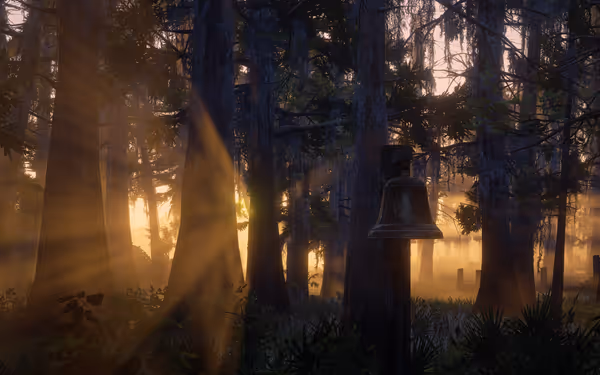 A bell hangs from a pole as sunlight streams through the trees in a misty, swampy forest.