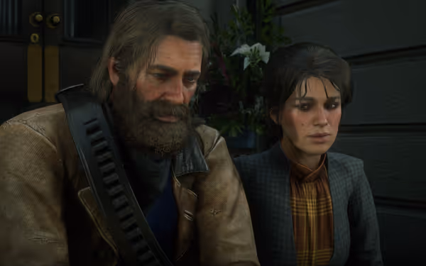 A rugged, bearded character in a coat sits beside a female character in a checkered dress.