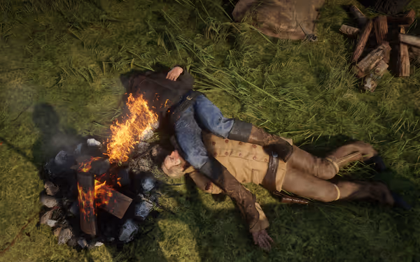 Two dead bodies of characters lie on the grassy surface, one headless, positioned beside a campfire.