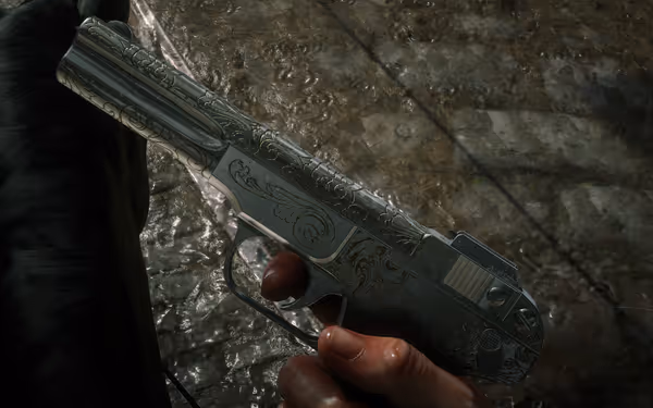 A hand grasps an ornate revolver adorned with intricate floral engravings.