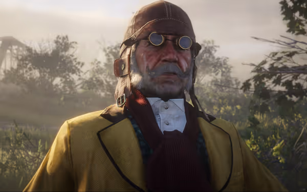 Person in yellow coat stands on grassy area near bridge.