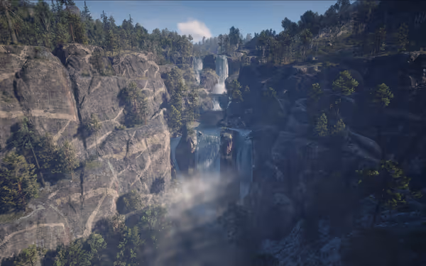 Waterfalls cascade between rocky cliffs with trees under a clear blue sky.
