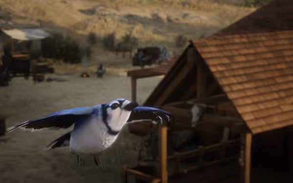 A bird is flying near a wooden cabin and campsite.
