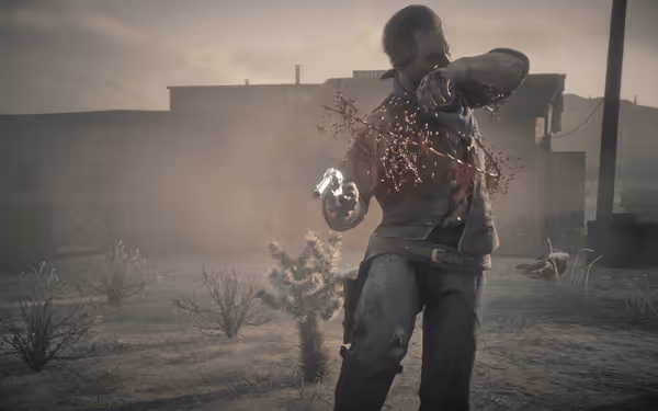A man holding a revolver is shot, with blood spraying, near a desert building.