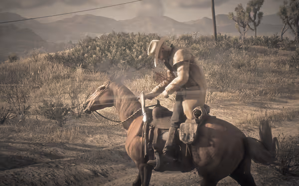 A cowboy on horseback in a desert landscape, got shot and slumps forward.