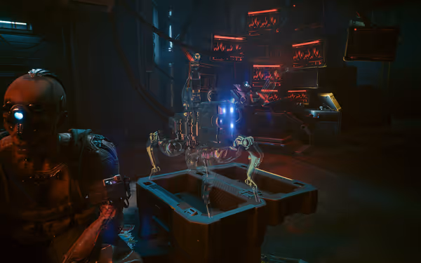 A cybernetic figure with a glowing eye sits near a holographic spider-like robot in a dark room