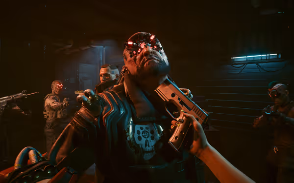 A bearded cybernetic man with glowing red eyes faces a gun to his throat