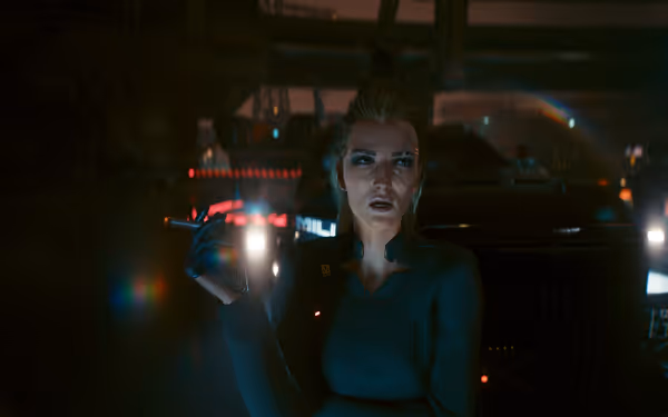 A cybernetic woman with facial implants smokes, standing before armored vehicles with bright lights