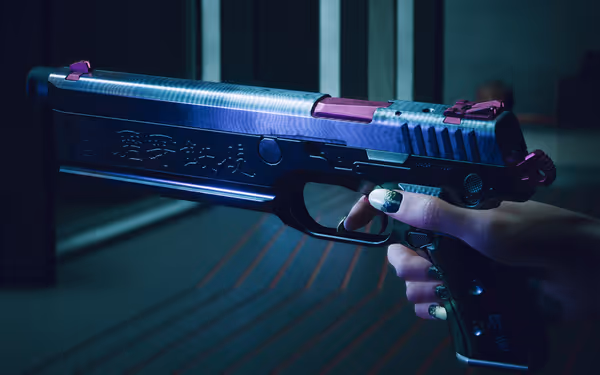 A hand with painted nails grips a futuristic pistol with engraved markings and neon lighting
