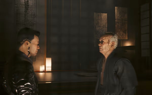 Two men with cybernetic enhancements stand in a dimly lit room with elegant decor