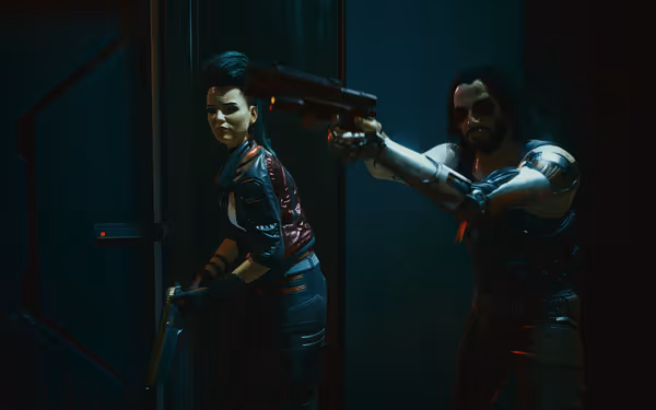 A woman with a pistol and a cybernetic-armed man aim weapons in a dim room