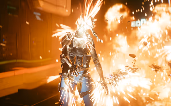 A cybernetic figure is engulfed in fire and sparks, with debris flying around.