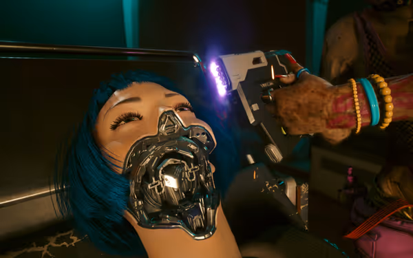 A woman with blue hair and a mechanical mouthpiece lies restrained as a figure holds a glowing device