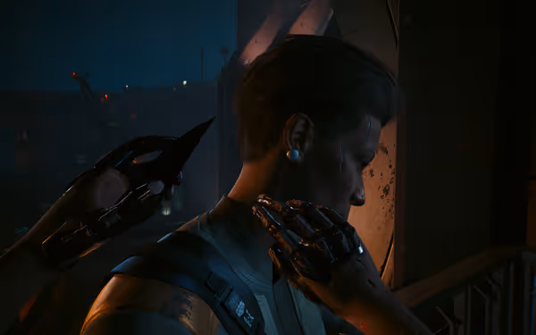 A cybernetic hand holds a sharp shard to someone’s neck under dim orange-blue lighting.