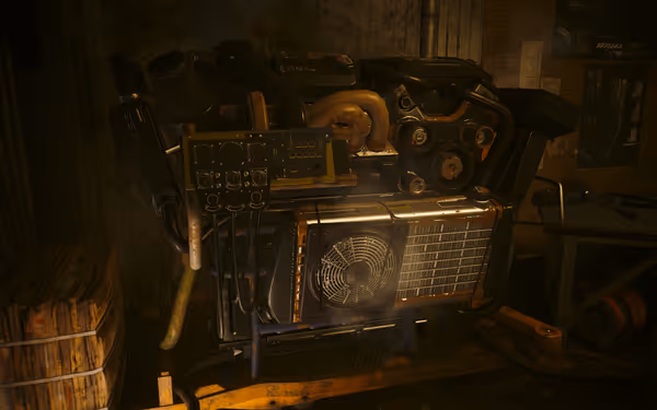 A large, rusted industrial engine with control panels and cooling fan sits in dim lighting.