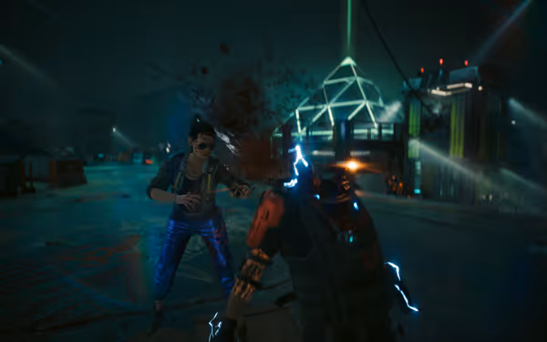 A woman in combat gear decapitates an enemy using a nanowire, causing blood to splatter into the air.