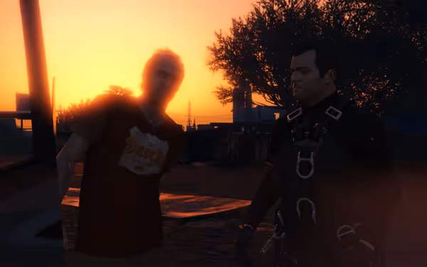 Two men stand outdoors at sunset, one in casual clothes and one in gear.