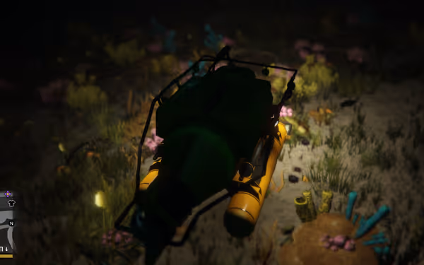 A green and yellow submersible vehicle rests on sandy ocean floor amid colorful glowing plants, with minimap showing 2m depth