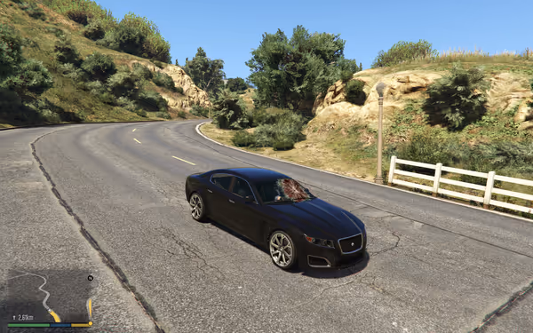 A black car with a blood-splattered windshield, parked on a curving road.