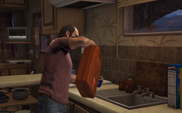 A man pours liquid from a red gas can into a cup at a kitchen sink.