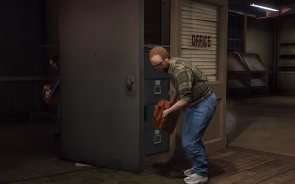 Two men are pouring liquid from red containers onto the floor inside an office room.