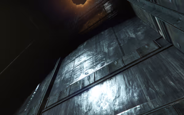 A tall, metallic, dimly-lit elevator shaft extends upward to a faint light at the top.