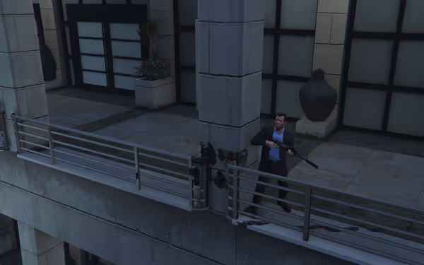 A man in a suit holds a rifle near a shattered railing on a building balcony.