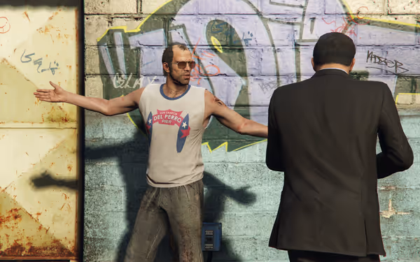 A man in sunglasses and a tank top gestures animatedly toward another man in a suit.