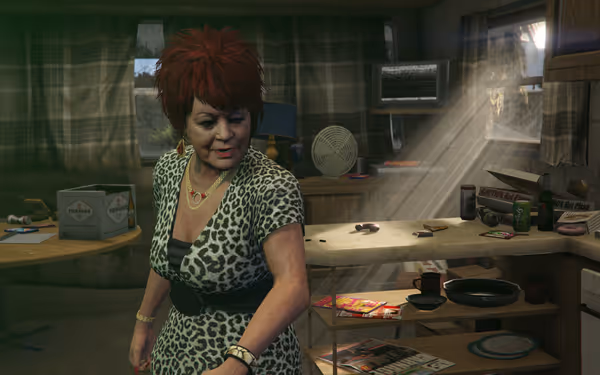 A woman with red spiky hair in a leopard print dress stands in a kitchen.