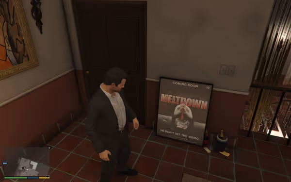 A man in a suit stands near a movie poster and champagne bottles in a hallway.