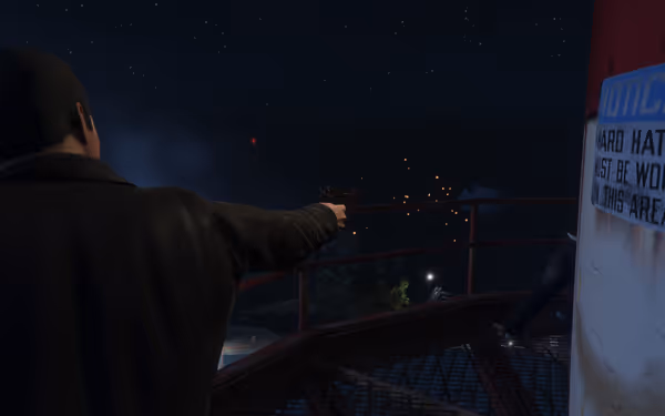 A man in a dark jacket fires a gun at night, sparks fly toward targets.