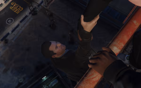 A man is reaching down to grab another person's hand, holding onto a railing.