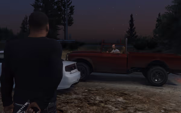 A man holding a gun stands near cars at dusk, facing a red truck and its driver.