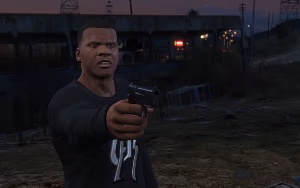 Man in dark shirt aiming a handgun forward, with wrecked bus in background at dusk.