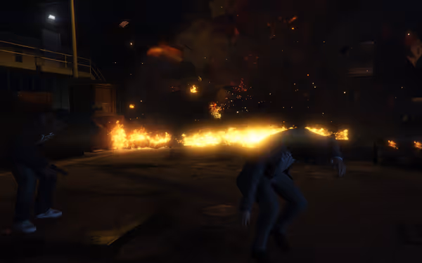 Two men are in a fiery explosion, one holding a gun and another in a suit.