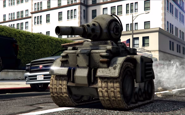 A small armored tank is parked on a city street near several cars.