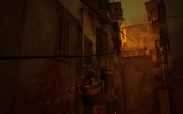 An orange cat rides in a hanging bucket through a dim alleyway.