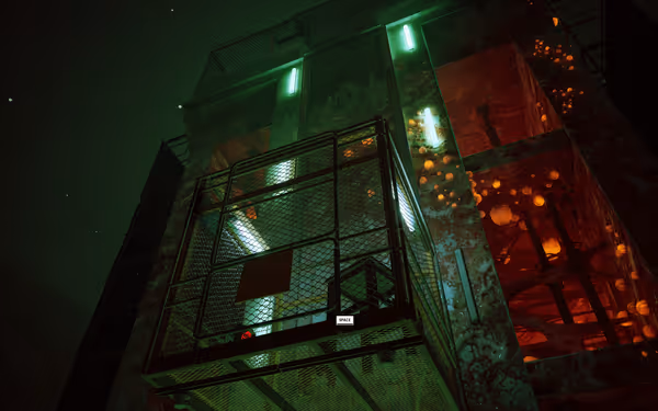 A metal lift platform with green lights stands beside a wall glowing with orange spores.